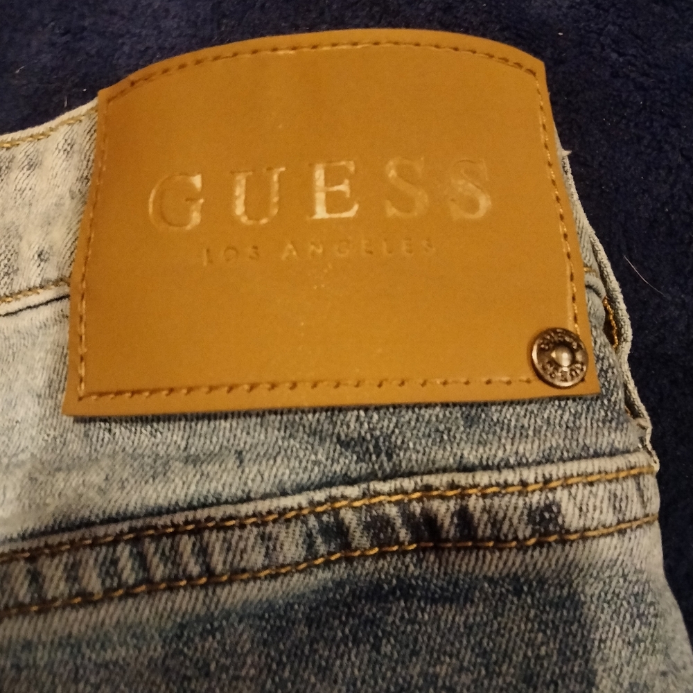 GUESS Men's Light Blue Denim Jeans with Tan Leather Patch